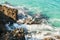 Natural rocks and clear waters at Kleopatra beach, Alanya, Turkey