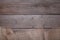 Natural sackcloth on grey wooden background. Canvas on grey wooden table