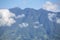 natural scenery of mountains crossing various clouds