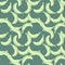 Natural seamless pattern with green random little banana fruit shapes. Pale green background. Doodle print