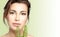 Natural skincare. Beauty Spa Woman with Fresh green leaves. Health and spa treatment concept