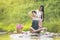 Natural Spa,Beautiful Woman relaxing in outdoor Massage with tropical flowers,