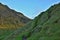 Natural staircase carved to green hill located in the south Iceland nearby the Skogafoss waterfall