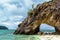 Natural stone arch with beautiful beach at Kho Khai near Tarutao national park and Koh Lipe in Satun, Andaman Sea, Thailand