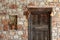 Natural stone facade and old wooden door