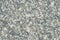 Natural stone gray granite background with untreated surface hard rock texture