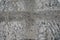 Natural stone gray granite background with untreated surface hard rock texture