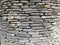 Natural stone masonry wall texture close-up