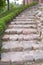 Natural stone steps along a flowerbed