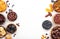 Natural sun dried fruits assortment in bowls on white background. Healthy wholesome snacks. Copy space