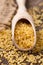 Natural super foods bulgur wheat grain in spoon