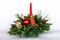 Natural table Christmas decoration with candle on white background