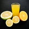 Natural tasty juice made of lemon, orange, mandarin, and sweetie on black background. Fruit concept