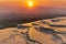 Natural travertine pools and terraces at sunset - Pamukkale