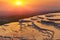 Natural travertine pools and terraces at sunset - Pamukkale