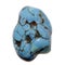 Natural turquoise cabochon on white background