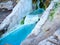 Natural underground mineral river and public bathtubs of cascade