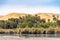 The natural vegetation with Palm trees and greenery on the banks of the River Nile in Egypt