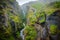 Natural view of the Glymur waterfall and vast landscape in Iceland