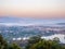 Natural viewpoint, mountains, hills, forests and river under morning mist