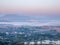 Natural viewpoint, mountains, hills, forests and river under morning mist