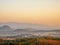 Natural viewpoint, mountains, hills, forests and river under morning mist