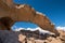 Natural volcanic rock arch formation in desertic landscape in Tenerife, Canary islands, Spain.