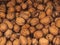 Natural walnut background pattern texture Abstract walnuts heap pattern background.
