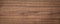 Natural walnut grain with beautiful wood grain. Walnut long planks texture. Walnut wood texture background.