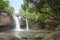 Natural water fall flare in the forest mountain.