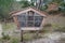 Natural wild bug hotel wood insect house ladybird wooden bee home in ecological gardening concept