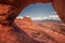 Natural window through which you can see the famous Delicates arch, sandstone and 16 meters high, near the town of Moab and the