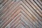 Natural wooden background herringbone, grunge parquet flooring design