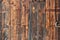 Natural, wooden, brown boards, wall of a barn with free space for your text.