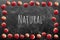 NATURAL word text title frame on vintage blackboard background and apples ornament