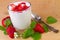 Natural yogurt with fresh strawberry