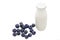 Natural yogurt with probiotics and Lactobacillus in small plastic bottle and Blueberry on white background