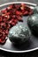 Naturally painted Easter eggs on black table, closeup. Hibiscus used for coloring