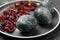 Naturally painted Easter eggs on black table, closeup. Hibiscus used for coloring