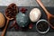 Naturally painted Easter eggs on grey table, top view. Hibiscus, tea and coffee beans used for coloring