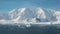 Nature of Antarctica. Icebergs against the background of mountains.Climate Change and Global Warming - Icebergs from