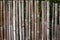 Nature background of old bamboo fence in shades of brown, creative copy space