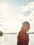 Nature brings me happiness. a happy young woman spending time by the lakeside.