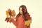 Nature changing color. Seasons concept. Fall season. Kid with fallen leaves white background. Happy small girl maple