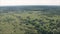 Nature conquers her. Overgrown fields a bird's-eye view. Abandoned Overgrown Fields