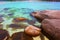 Nature display big and small brown rock on beach and under water abstract background,copy space