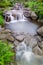 Nature garden with cascade small waterfall