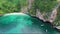 Nature of green island beach with boats on sea aerial view