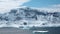 Nature. Icebergs. Arctic winter landscape at global warming problem. Icebergs melt at turquoise ocean bay. Glacier at