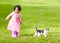 Nature, kitten and girl playing in a garden on the grass on a summer weekend together. Happy, sunshine and portrait of